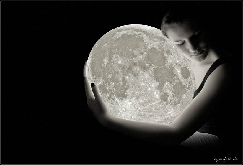 girl embracing moon